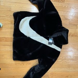 Women’s size medium oversized faux fur black and white Nike jacket